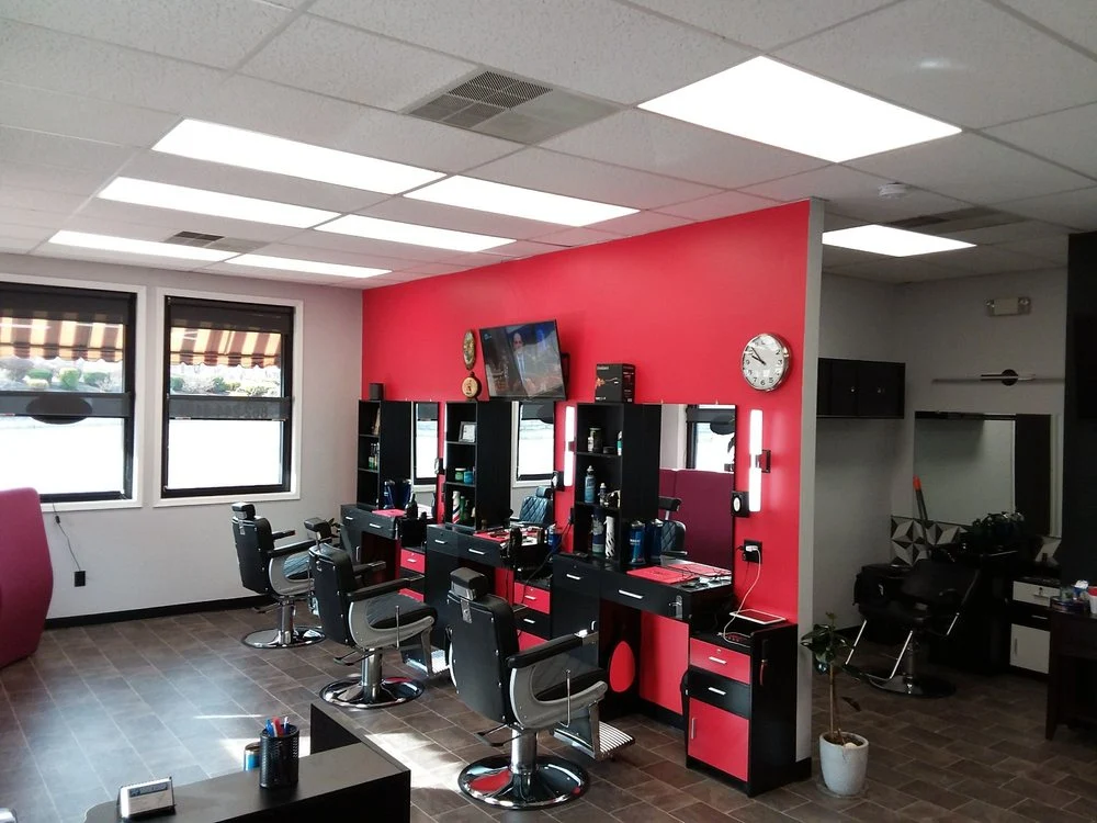 Ilia's Barbershop interior with professional barber stations
