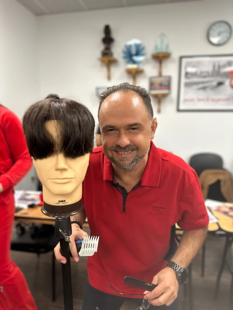 Ilia, master barber with 30+ years of experience